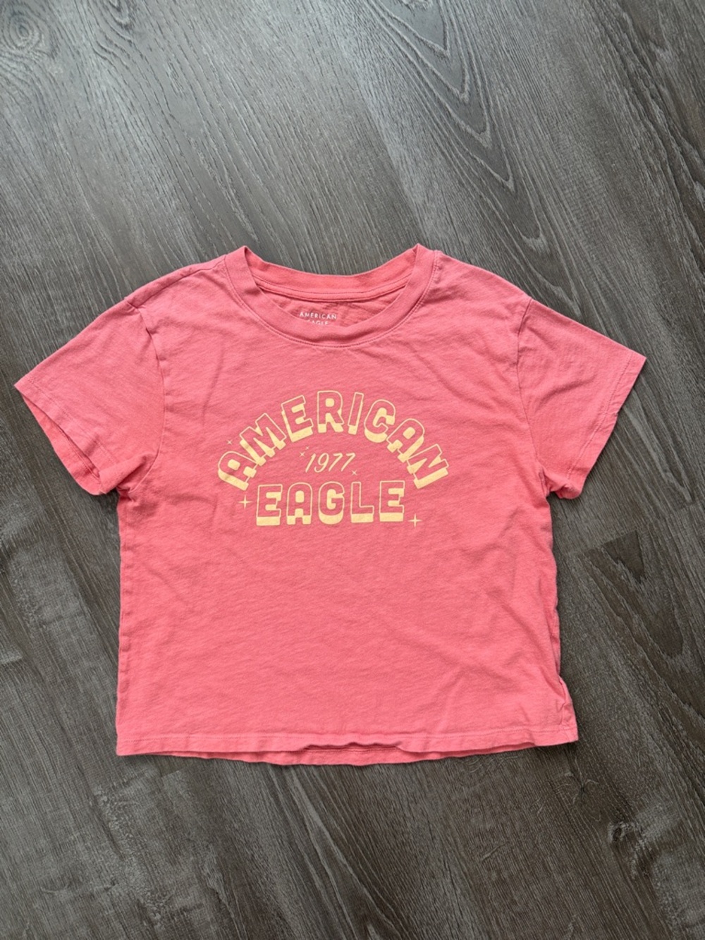 American Eagle Outfitters Coral Pink Graphic Tee with Yellow Logo